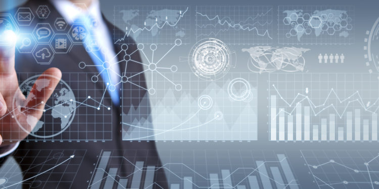 Businessman in his office during a presentation with charts screens